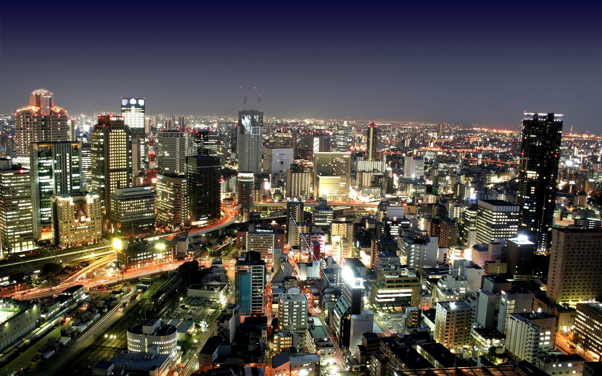 A night city with high-rises and skyscrapers