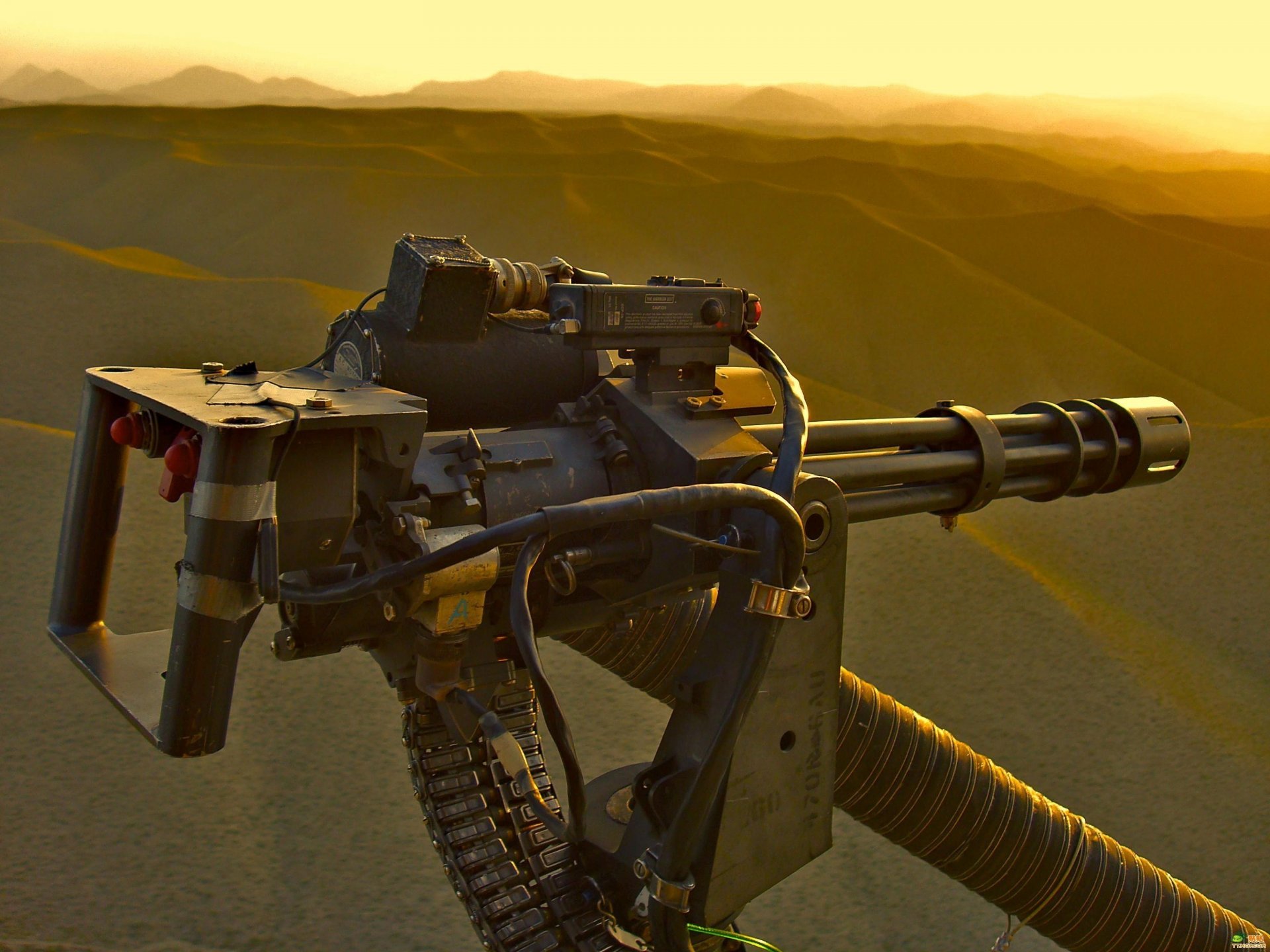 Weapons from a helicopter at sunset