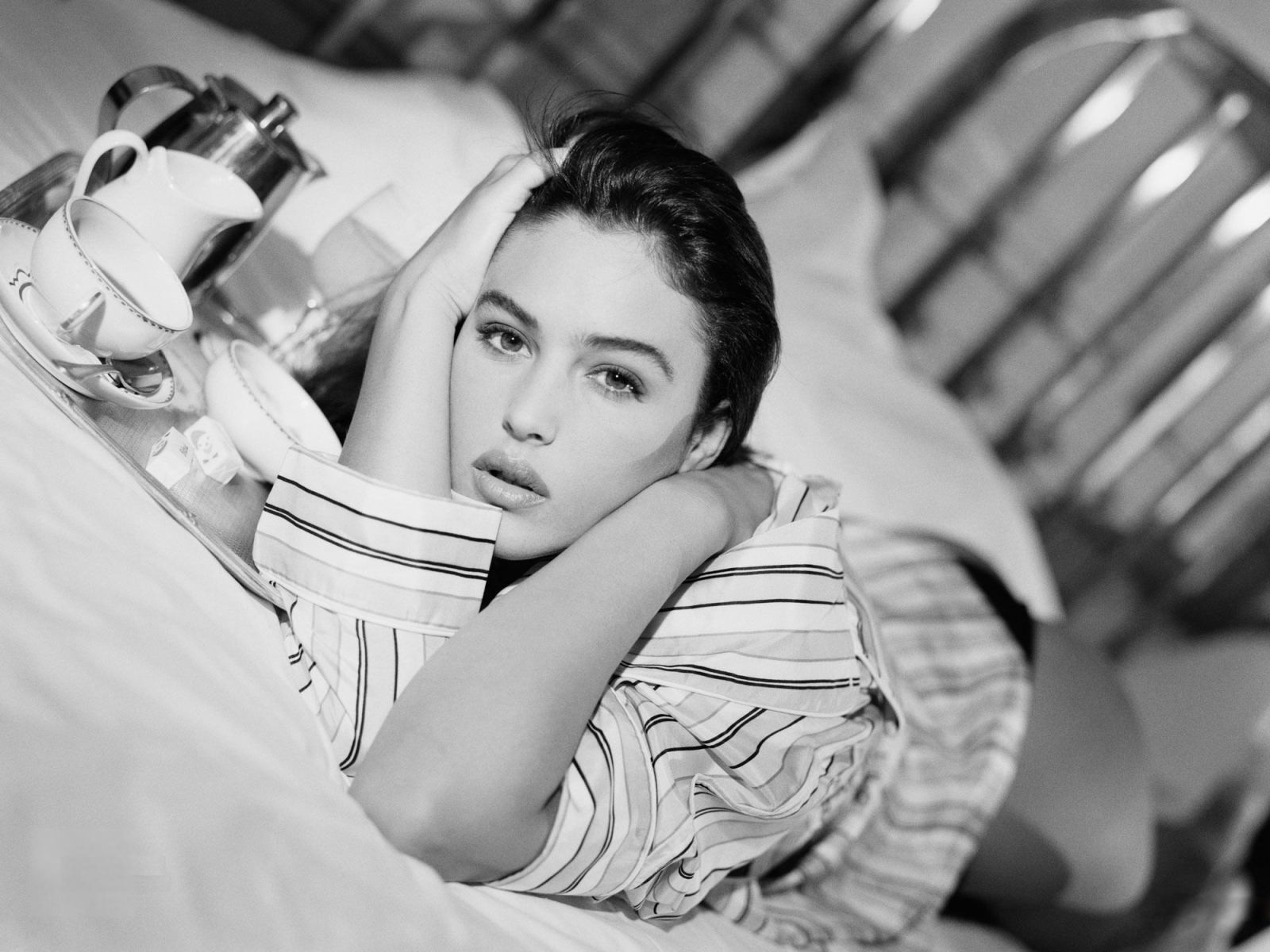 monica bellucci bed black and white coffee cups