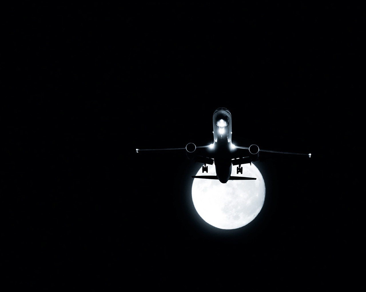 plane moon night