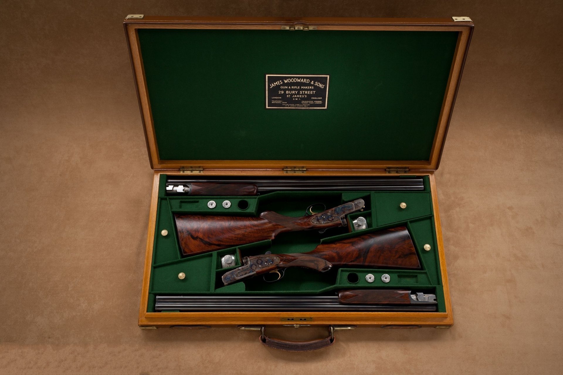 Hunting rifle in a green case