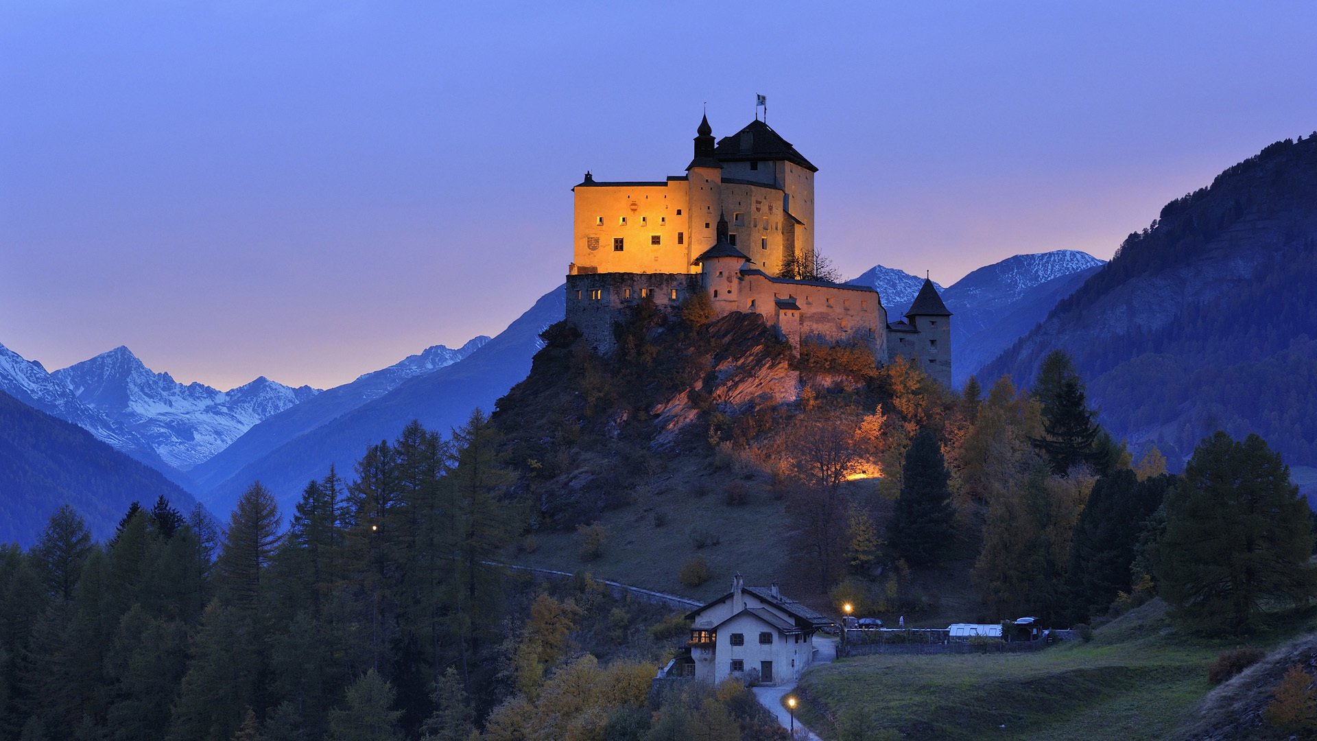 Evening castle on the hill of the mountain