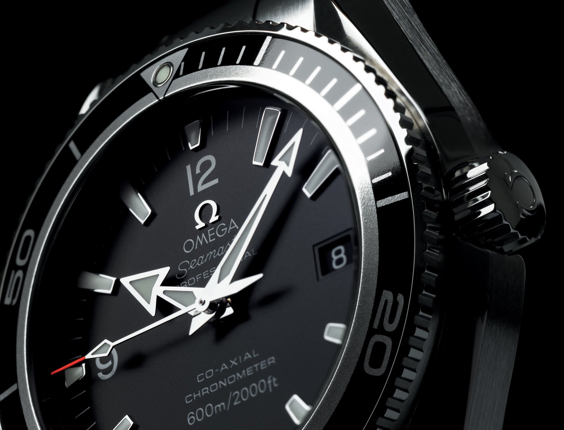 watches omega of the arrow face black and white