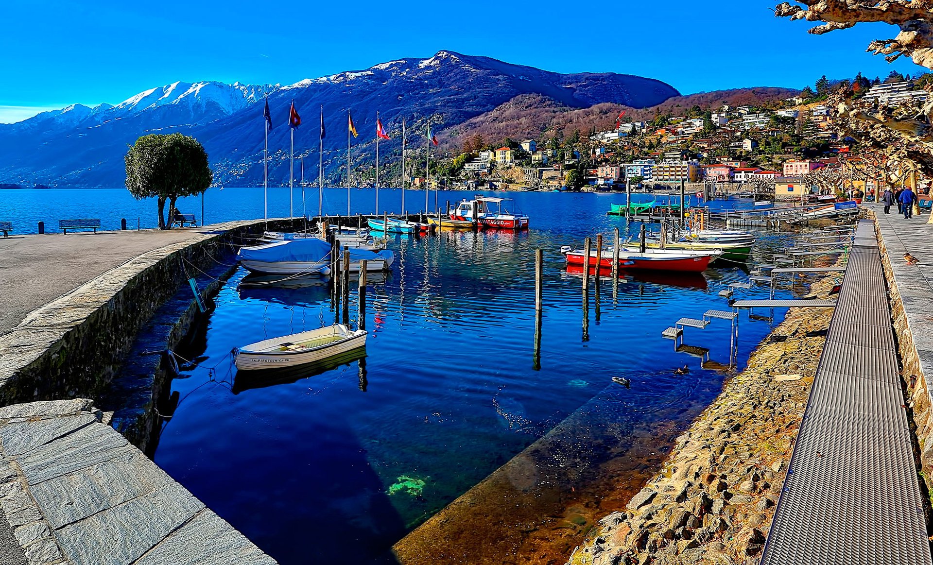 ascona switzerland landscape sky mountain lake house embankment boat yacht