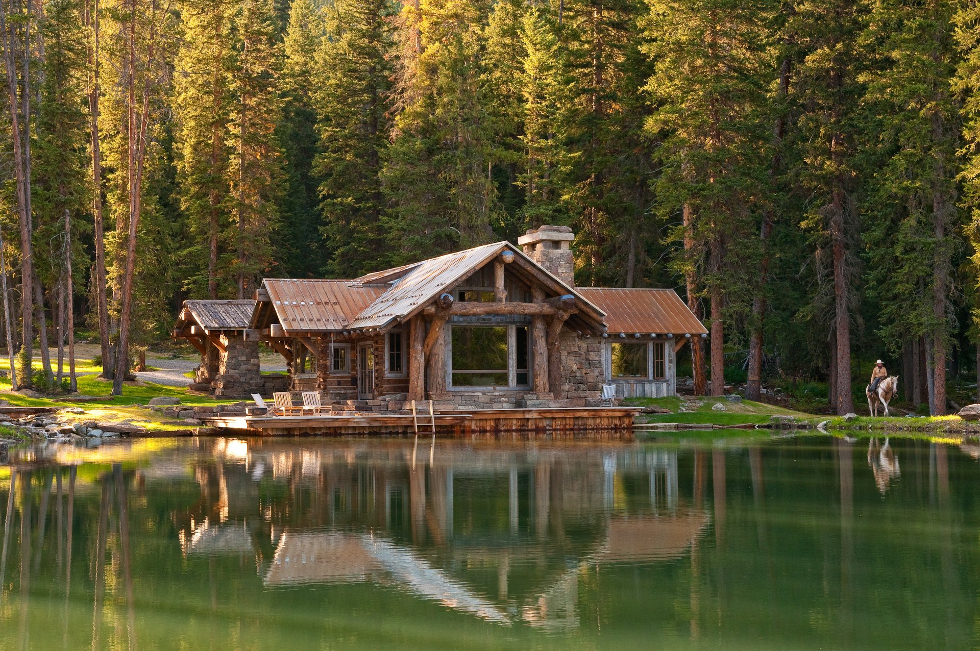 House near the lake in the forest